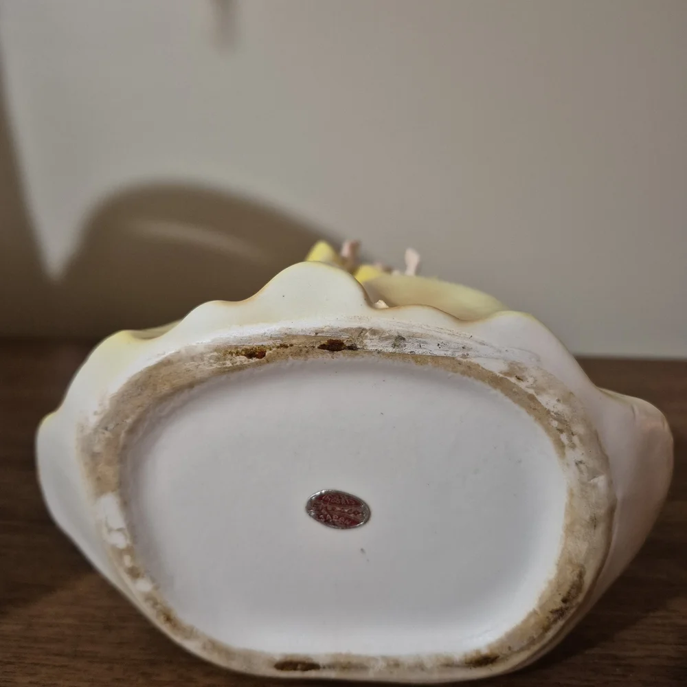 Vintage Yellow Ceramic Figurine